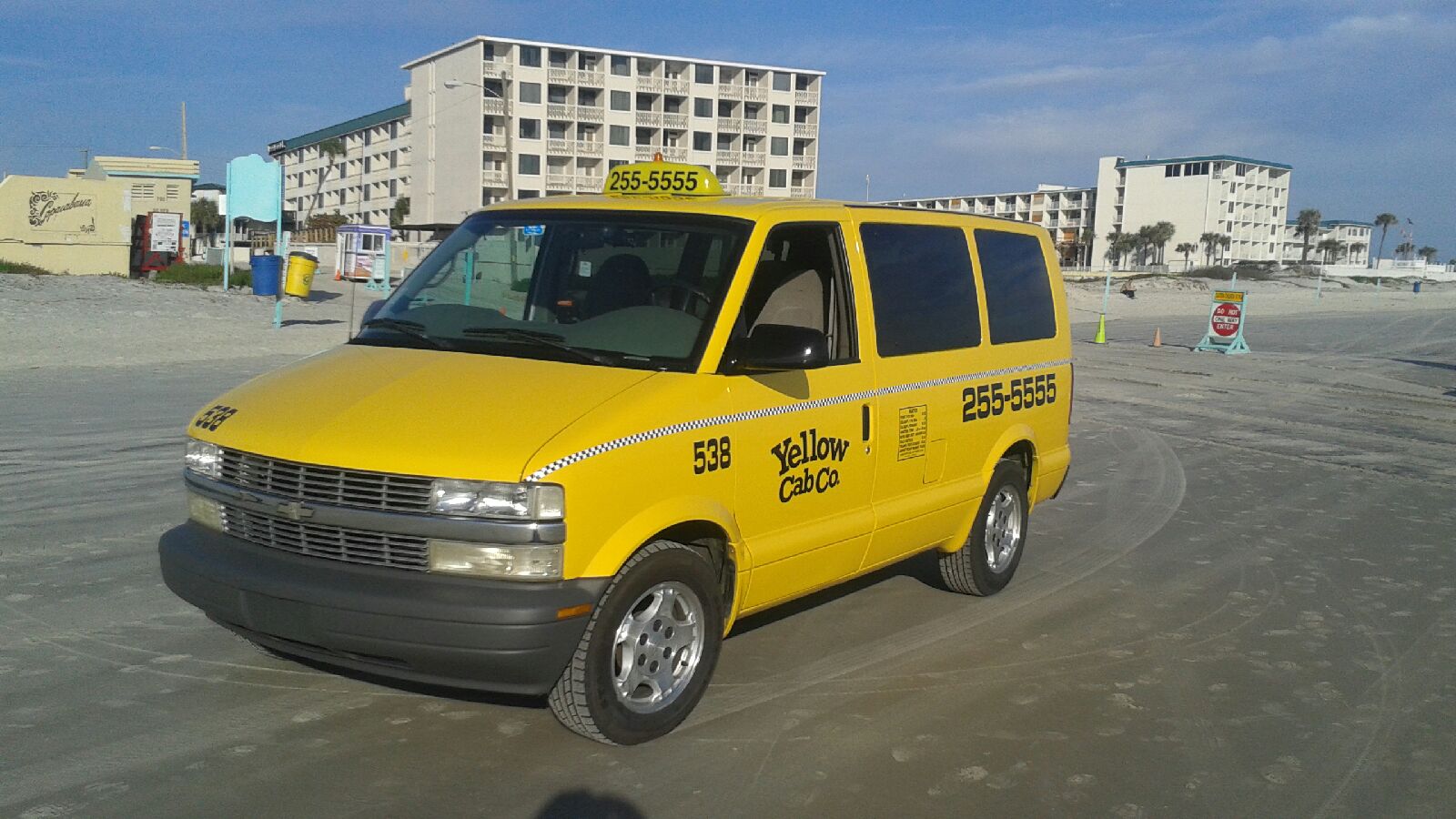 Daytona Beach taxi Yellow Cab cruises the beach